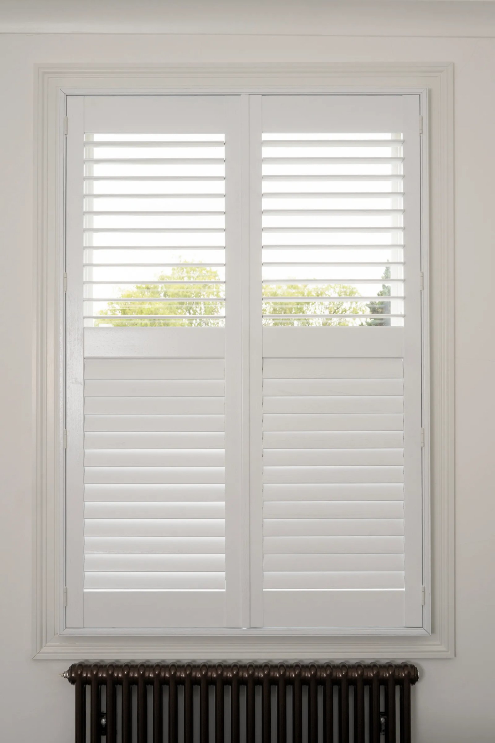 Full-height shutters covering a whole window top to bottom in an Ipswich home